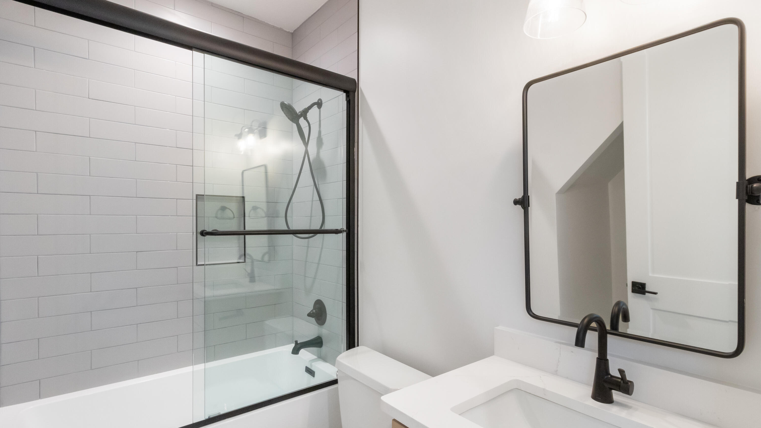 80 Muzzle Street Freeport, FL 32439 - Photo 37 of 71 a bathroom with a sink and a mirror