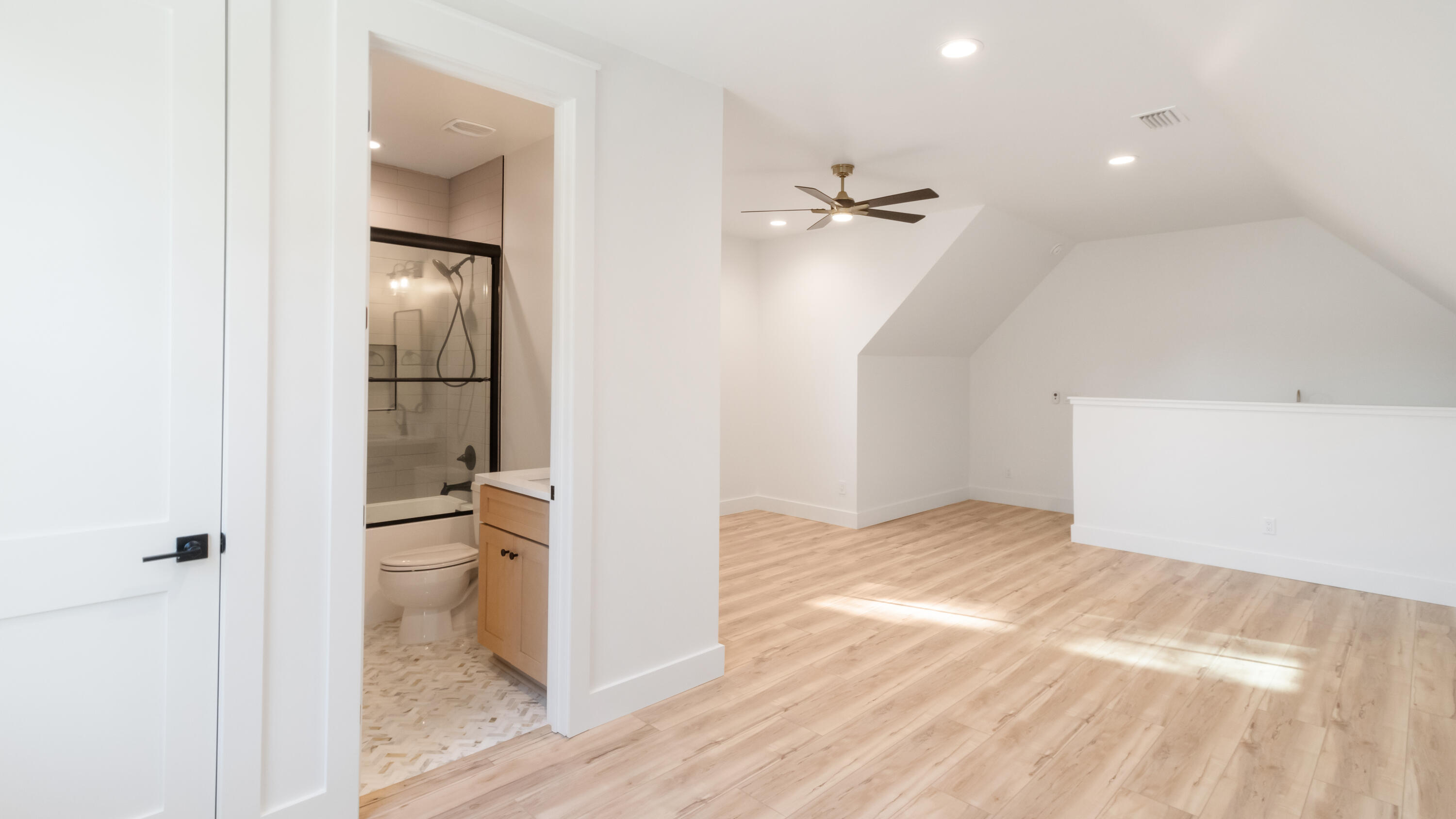 80 Muzzle Street Freeport, FL 32439 - Photo 39 of 71 a bathroom with a granite countertop toilet and a shower