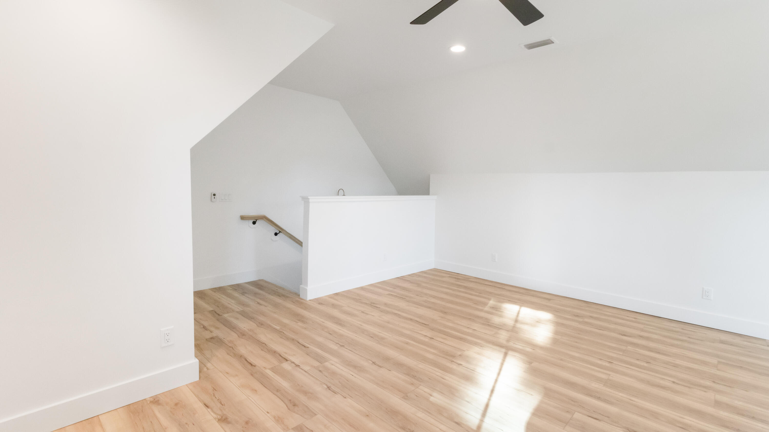 80 Muzzle Street Freeport, FL 32439 - Photo 40 of 71 a view of empty room with wooden floor