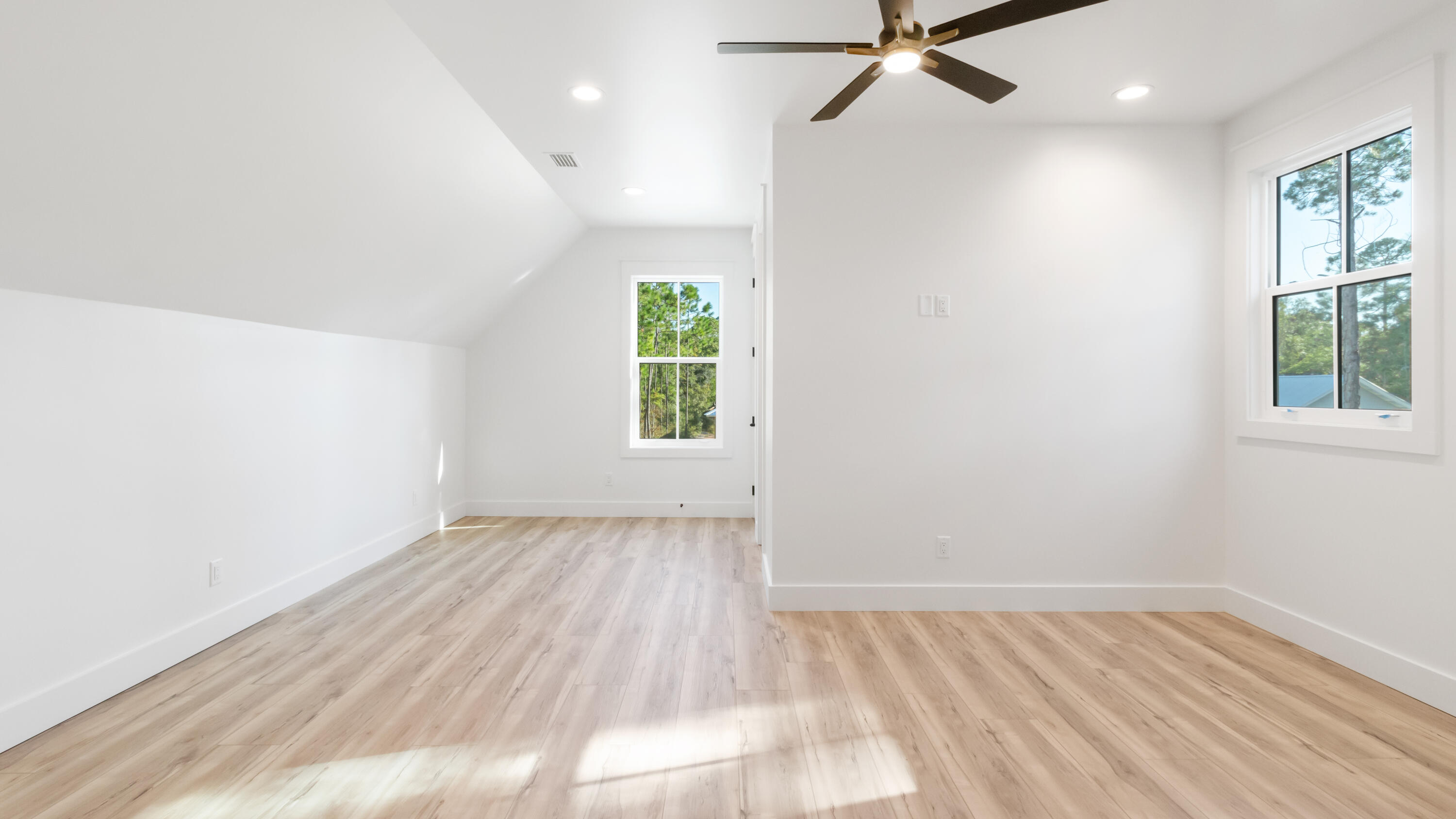 80 Muzzle Street Freeport, FL 32439 - Photo 41 of 71 wooden floor in an empty room with a window