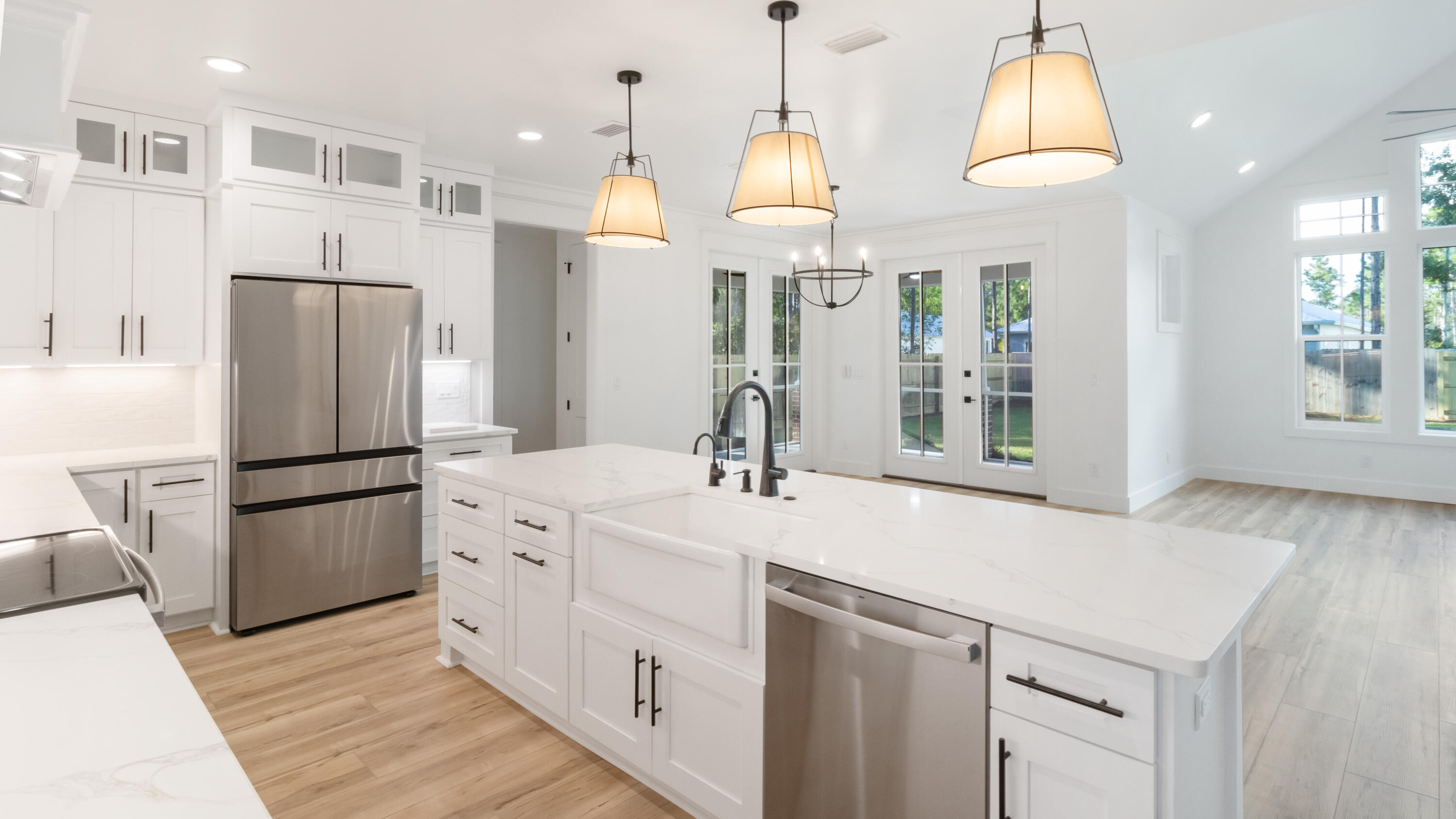 80 Muzzle Street Freeport, FL 32439 - Photo 52 of 71 a kitchen with stainless steel appliances a refrigerator a sink and a stove