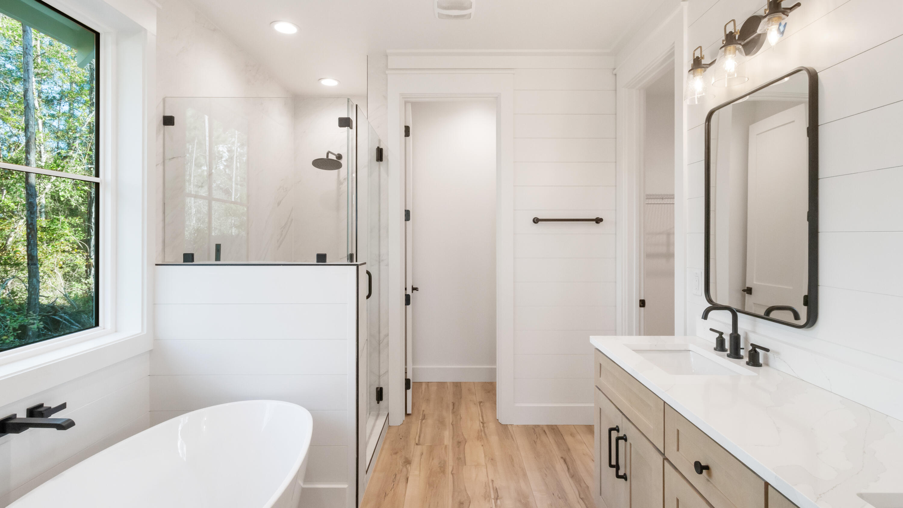 80 Muzzle Street Freeport, FL 32439 - Photo 10 of 71 a bathroom with a sink a toilet a mirror and shower