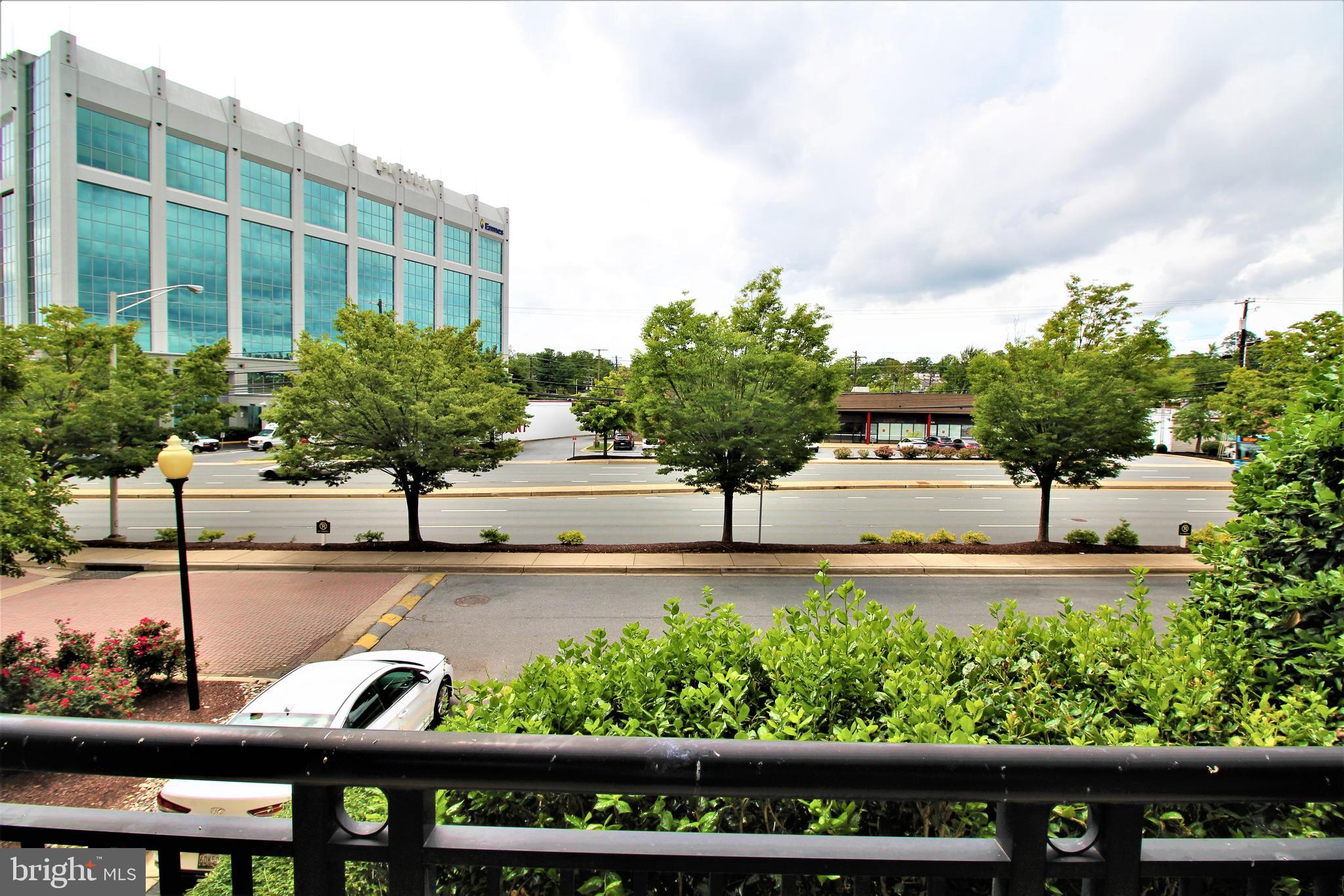 501 Hungerford Drive, Unit 137 Rockville, MD 20850 - Photo 25 of 37 a view of a yard with an outdoor seating