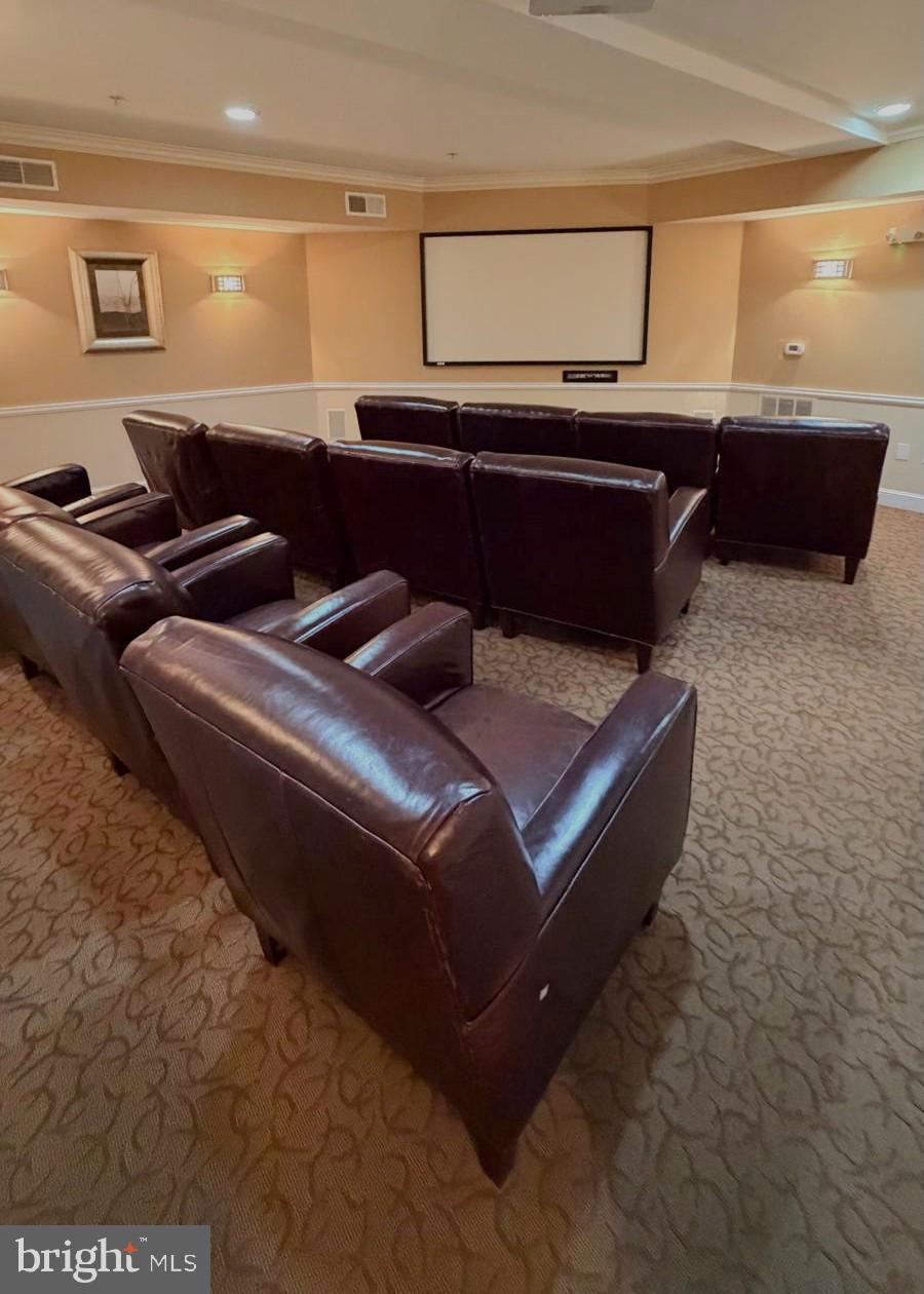 501 Hungerford Drive, Unit 137 Rockville, MD 20850 - Photo 31 of 37 a living room with furniture