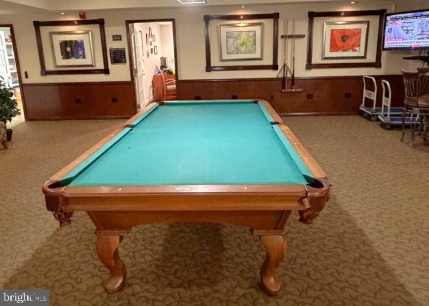 501 Hungerford Drive, Unit 137 Rockville, MD 20850 - Photo 32 of 37 a room with pool table and windows