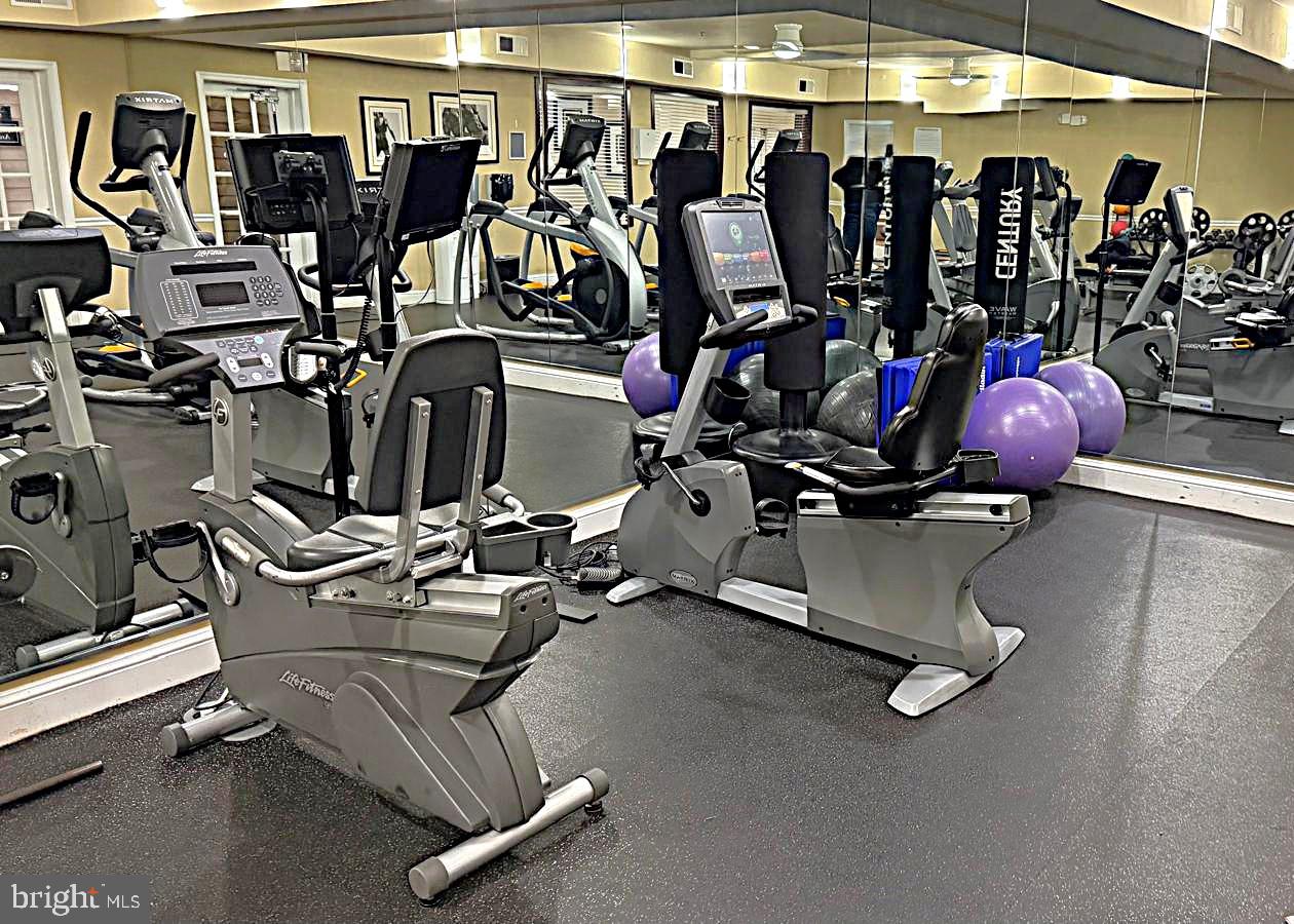 501 Hungerford Drive, Unit 137 Rockville, MD 20850 - Photo 33 of 37 a view of a room with gym equipment