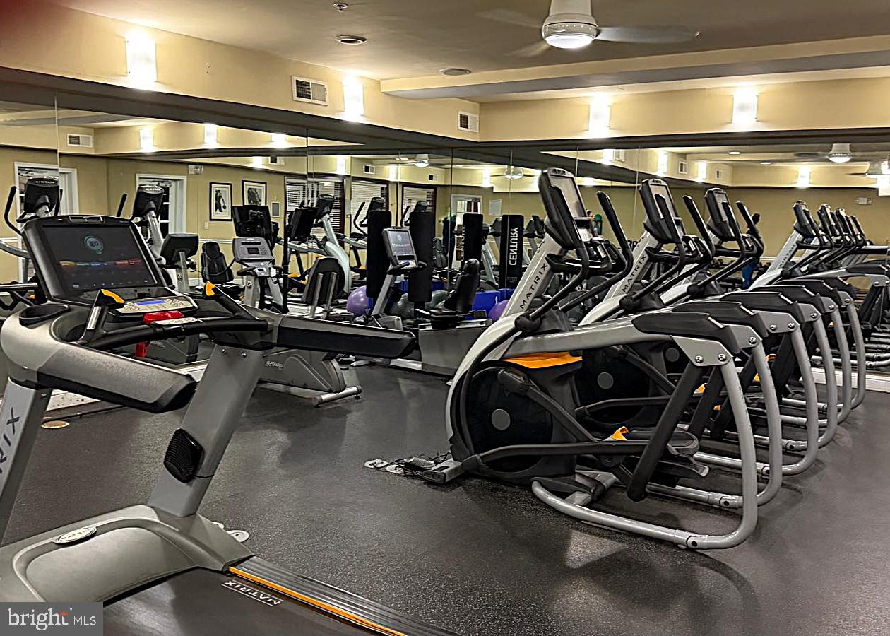 501 Hungerford Drive, Unit 137 Rockville, MD 20850 - Photo 34 of 37 a view of a room with gym equipment