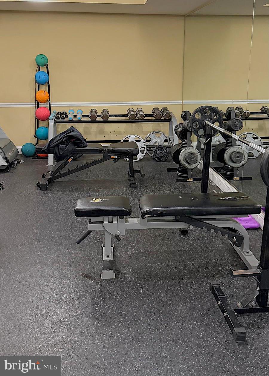 501 Hungerford Drive, Unit 137 Rockville, MD 20850 - Photo 35 of 37 a view of a room with gym equipment