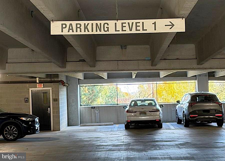 501 Hungerford Drive, Unit 137 Rockville, MD 20850 - Photo 37 of 37 a car parked in a parking garage