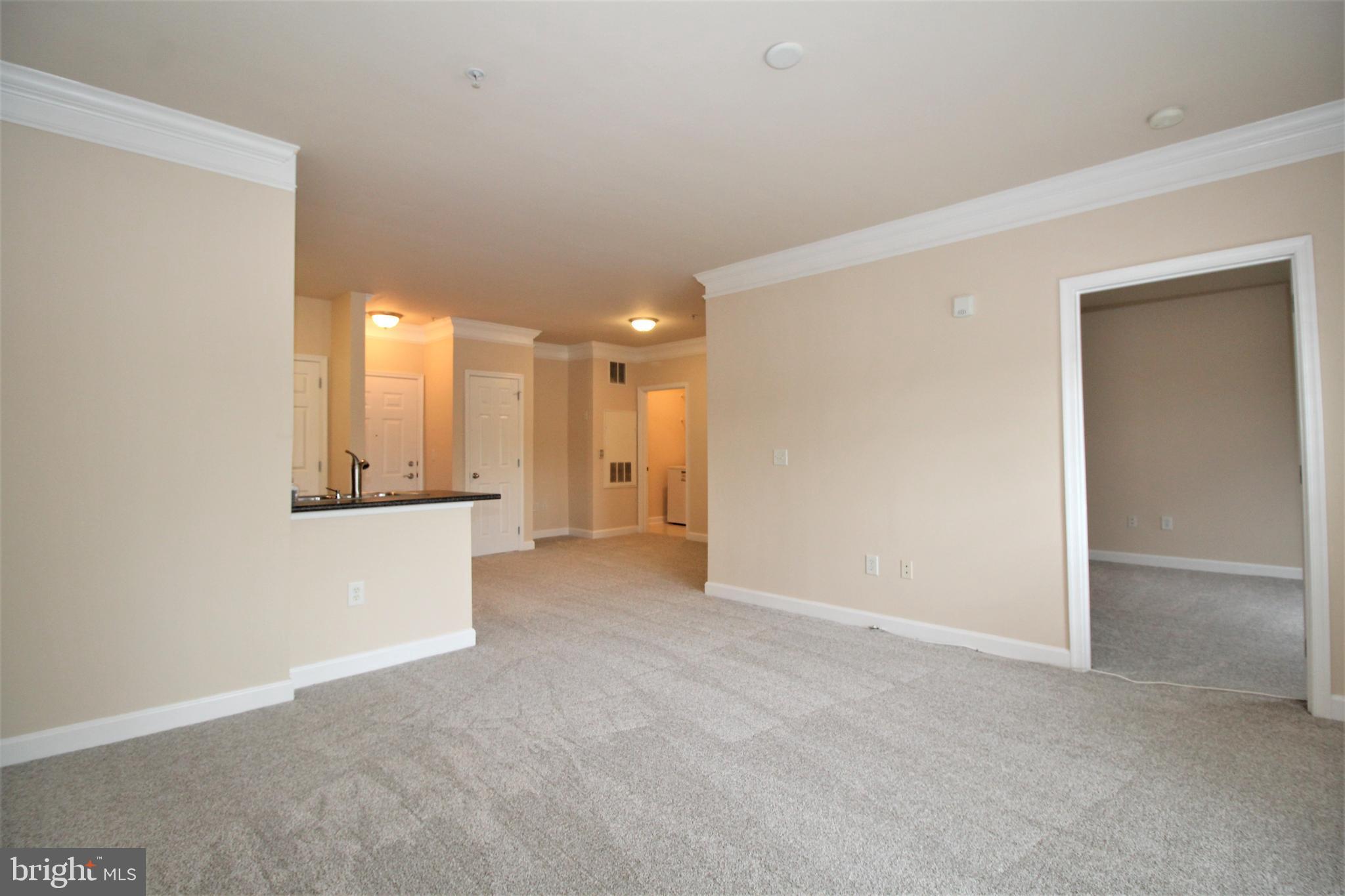 501 Hungerford Drive, Unit 137 Rockville, MD 20850 - Photo 8 of 37 a view of an empty room