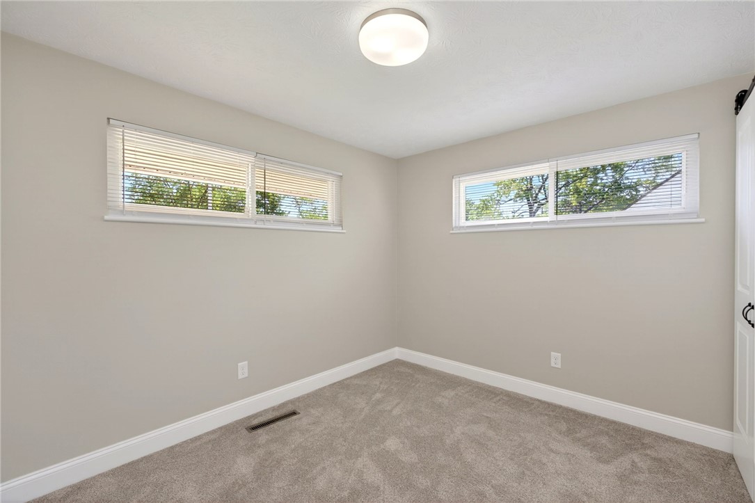 5975 Rosalie Road Dayton, OH 45424 - Photo 19 of 48 This bright and airy room offers a comfortable and inviting atmosphere.
