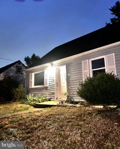 a front view of house with yard