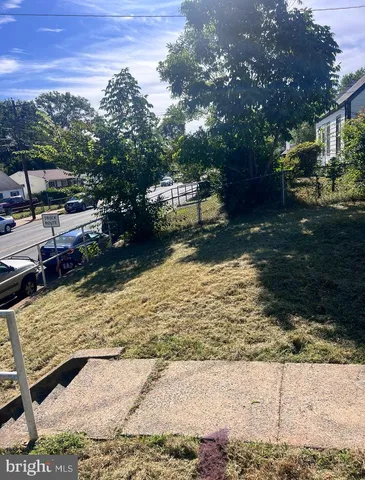 a view of swimming pool with a patio