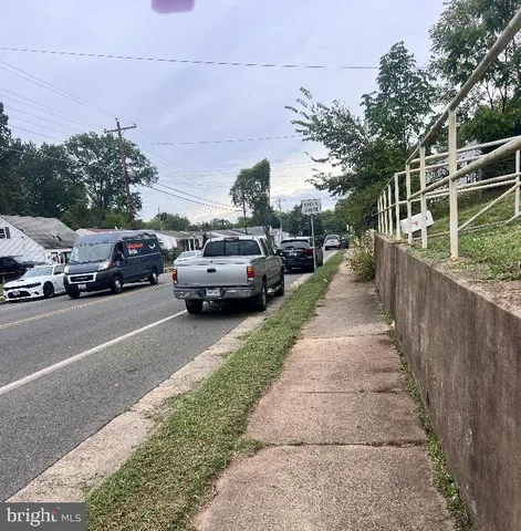 a view of a car parked on the side of the road