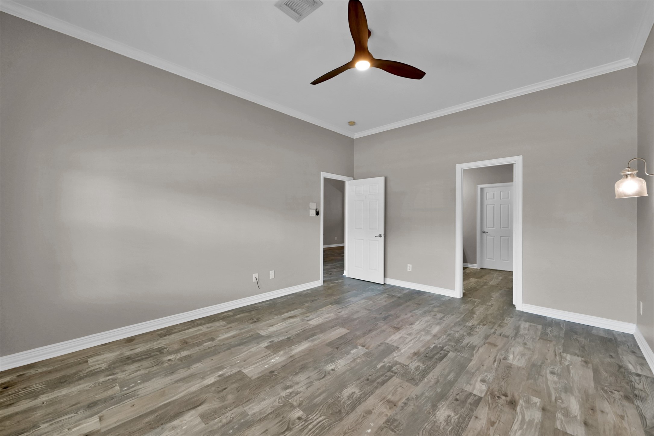 9222 Sunlight Oak Lane Houston, TX 77070 - Photo 13 of 29 a view of an empty room with window and chandelier fan