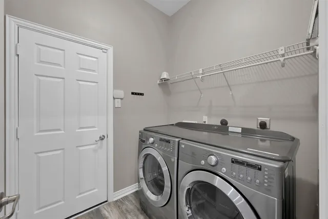 a utility room with dryer and washer