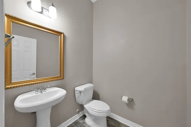 a bathroom with a sink and a toilet