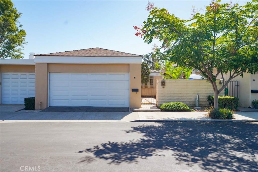 6 Seton Road Irvine, CA 92612 - Photo 1 of 1 a front view of a house with garden