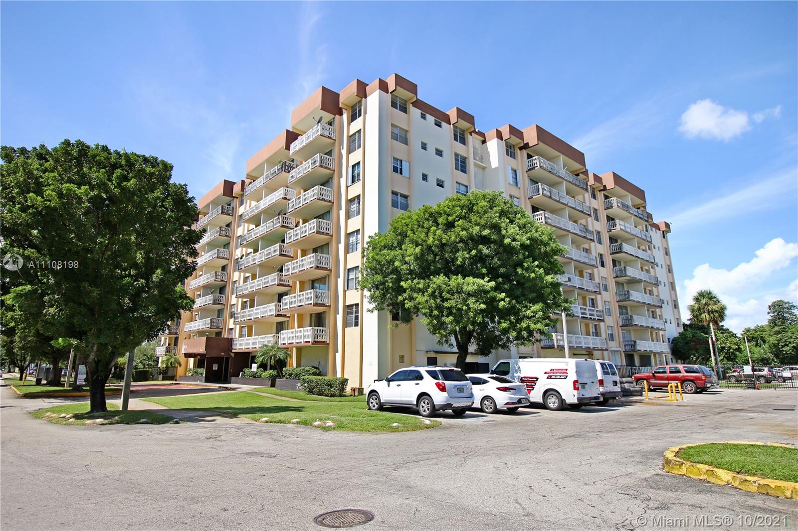 15600 Northwest 7th Avenue, Unit 3011 Miami, FL 33169 - Photo 29 of 30 a view of a parked cars in front of a building