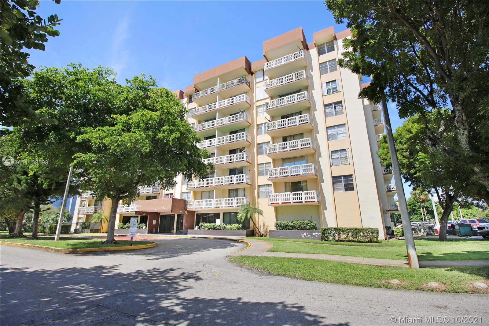 15600 Northwest 7th Avenue, Unit 3011 Miami, FL 33169 - Photo 30 of 30 a view of a building with a yard