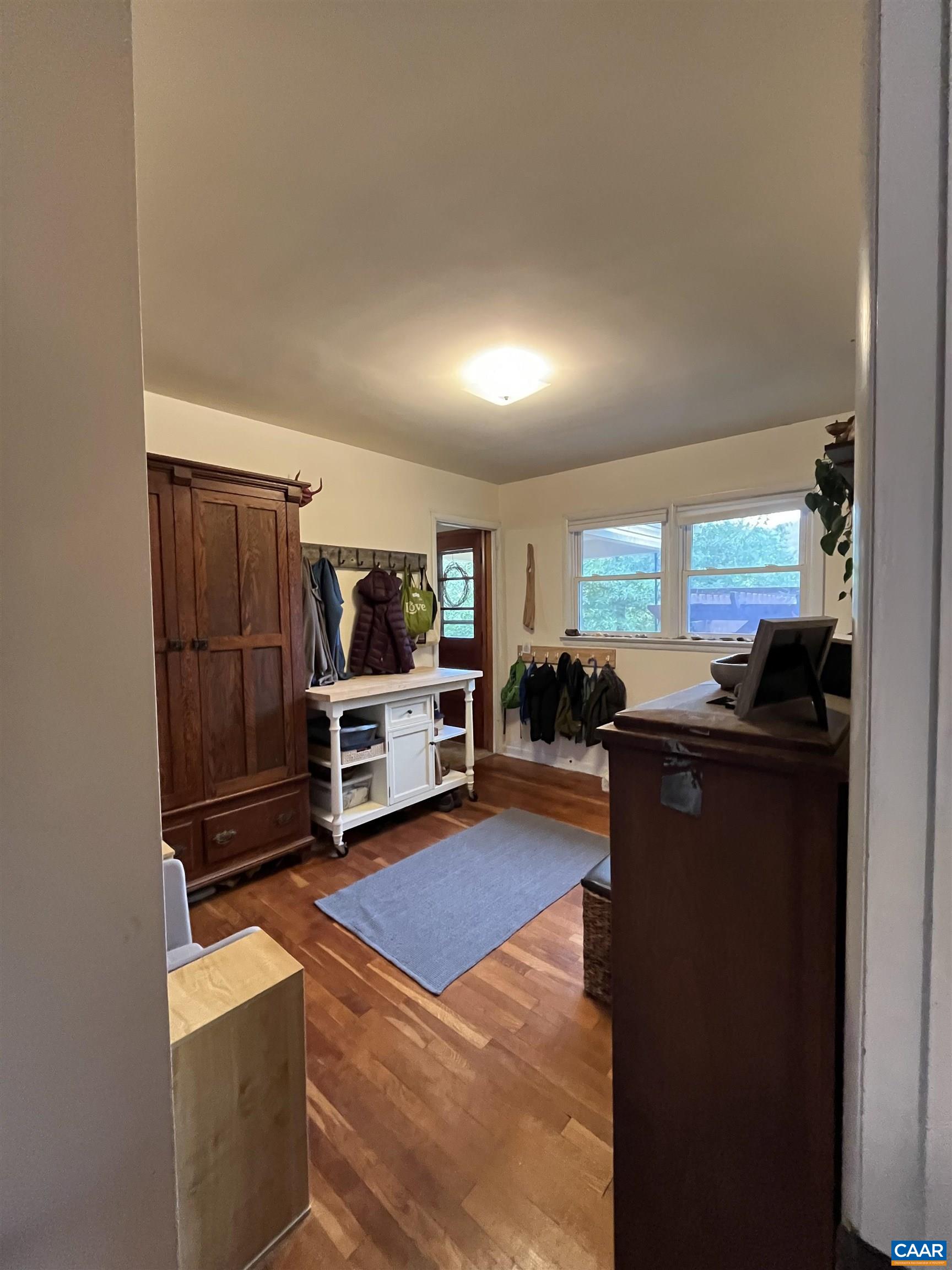 1839 Afton Mountain Road Afton, VA 22920 - Photo 9 of 11 a living room with furniture and a flat screen tv
