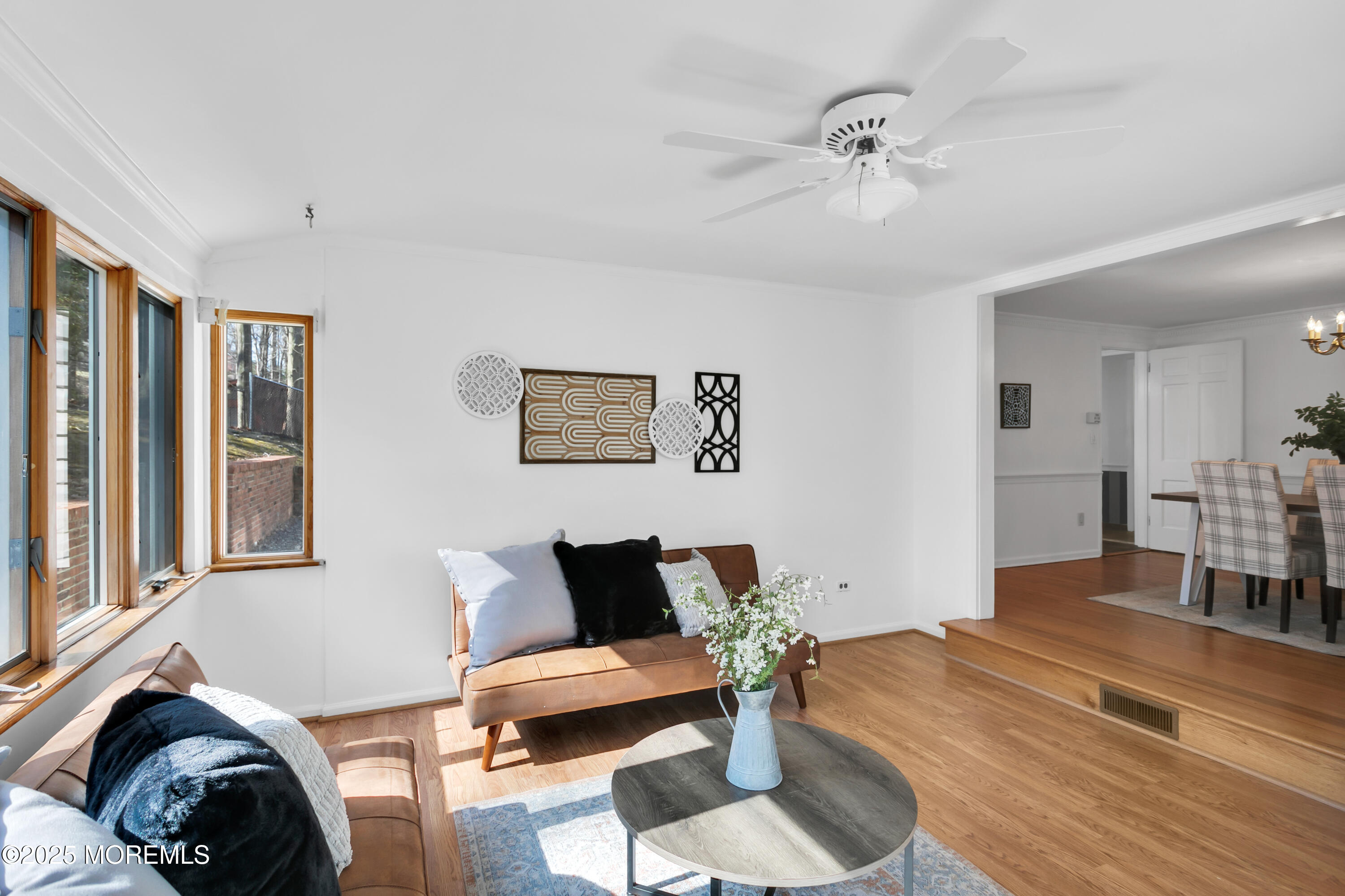 160 Pelican Road Middletown, NJ 07748 - Photo 15 of 65 a living room with furniture and a table