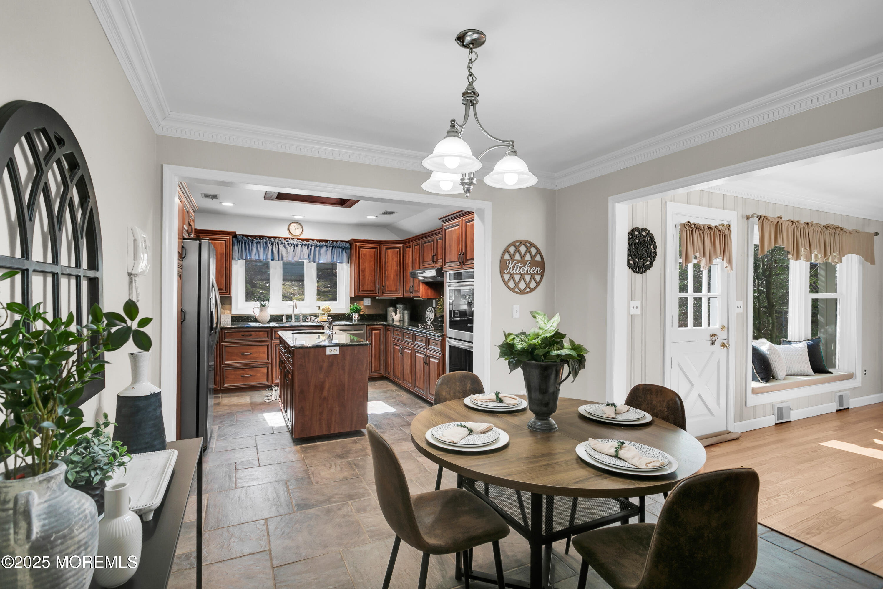 160 Pelican Road Middletown, NJ 07748 - Photo 19 of 65 a dining room with furniture a chandelier and window
