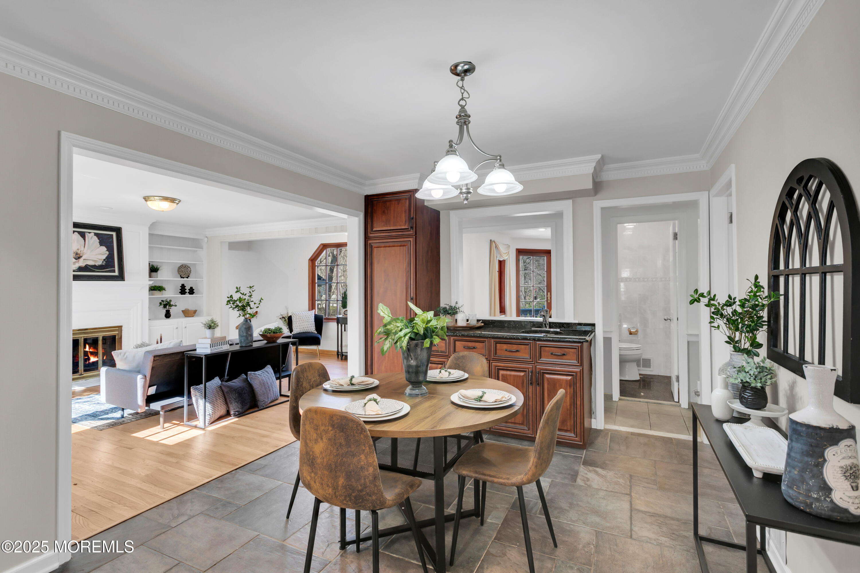 160 Pelican Road Middletown, NJ 07748 - Photo 20 of 65 a view of a dining room with furniture and chandelier