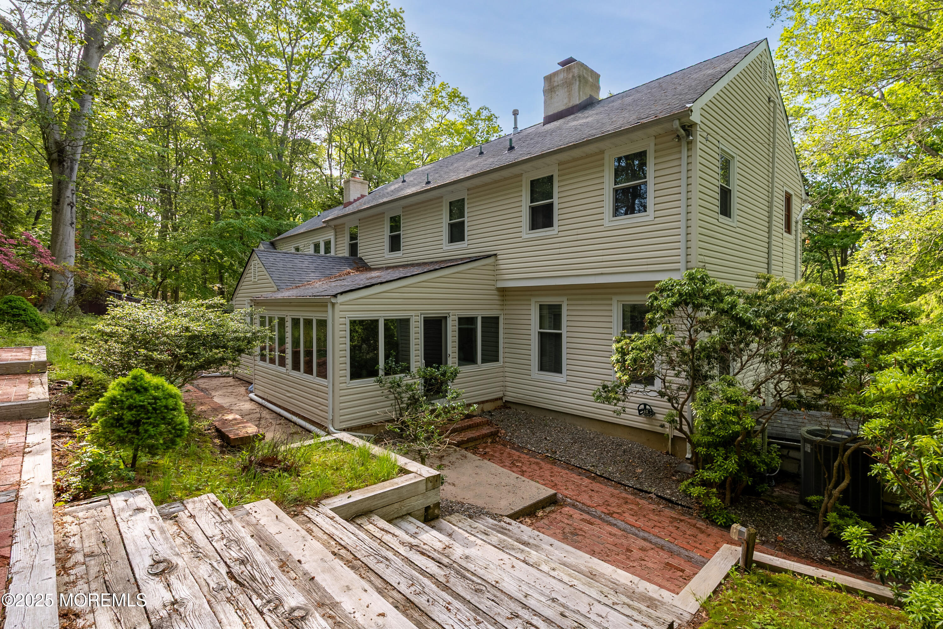 160 Pelican Road Middletown, NJ 07748 - Photo 40 of 65 a front view of house with yard outdoor space and seating