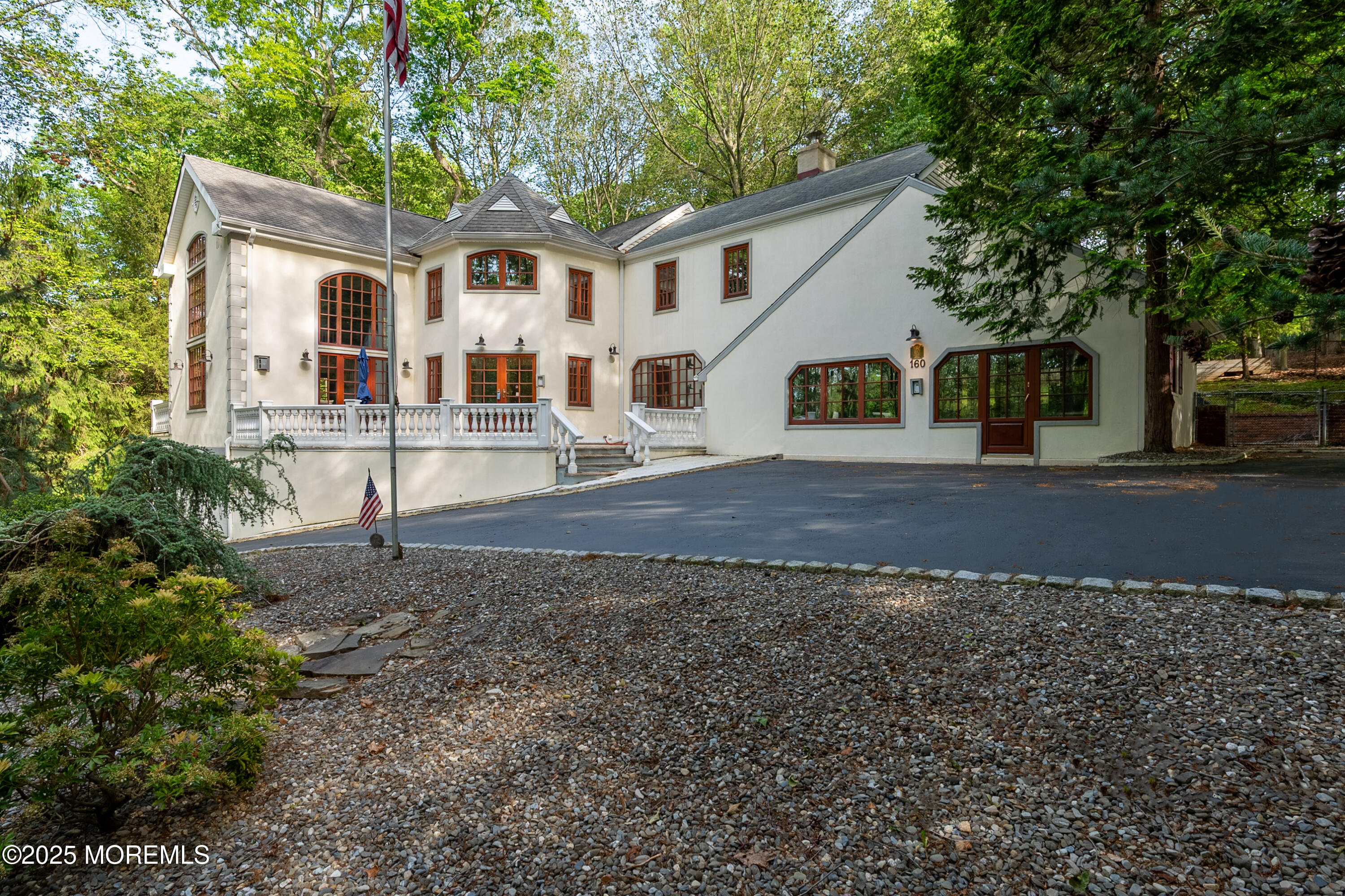 160 Pelican Road Middletown, NJ 07748 - Photo 5 of 65 a front view of a house with a yard and trees