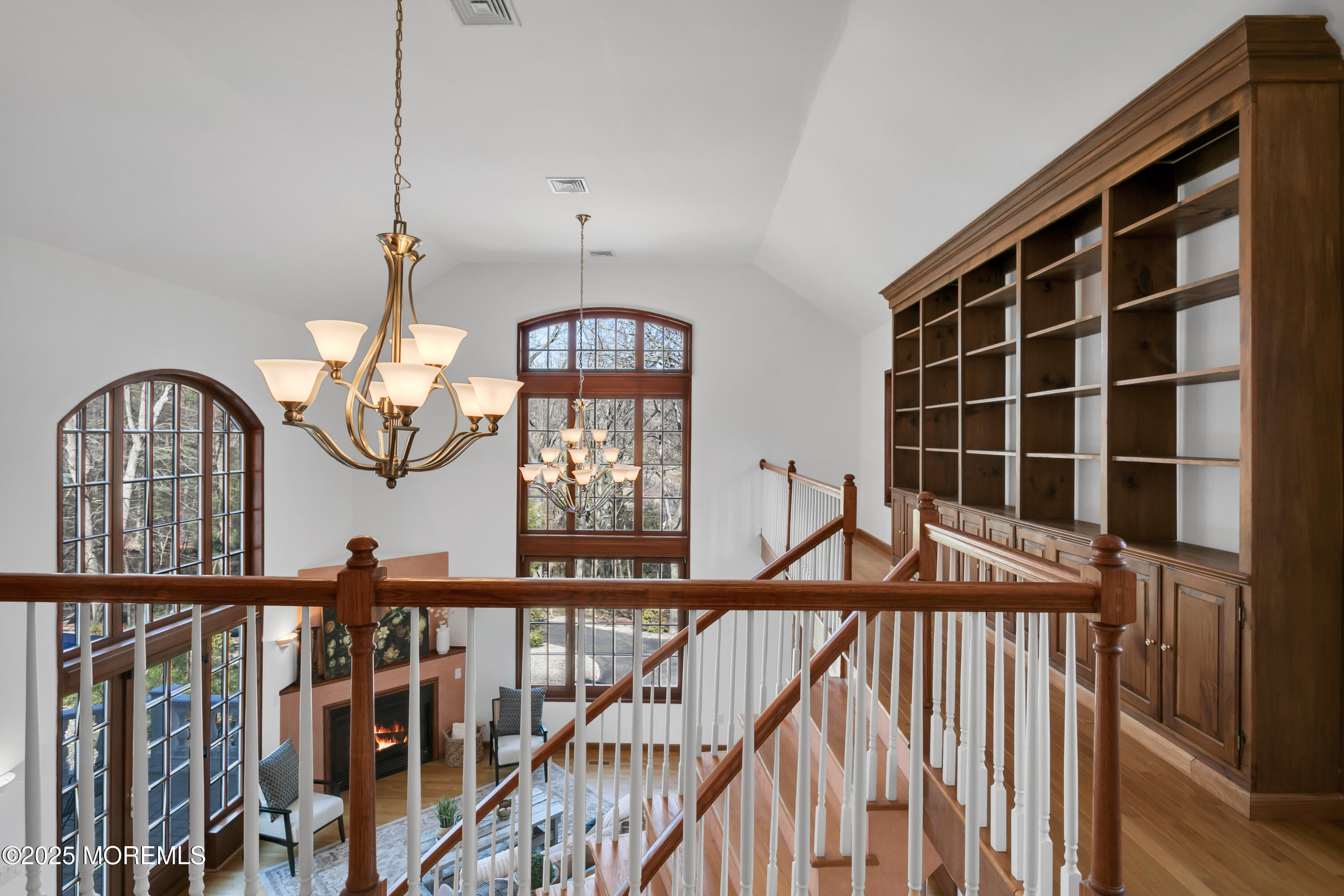 160 Pelican Road Middletown, NJ 07748 - Photo 10 of 65 a view of staircase with a large window and wooden floor