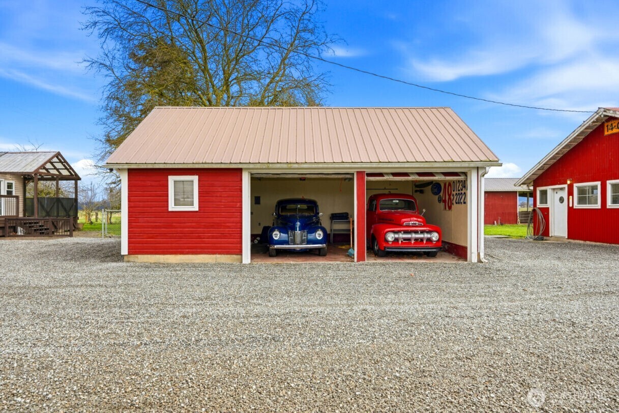 19500 Dahlstedt Road Burlington, WA 98233 - Photo 31 of 39 a view of a house with truck parked