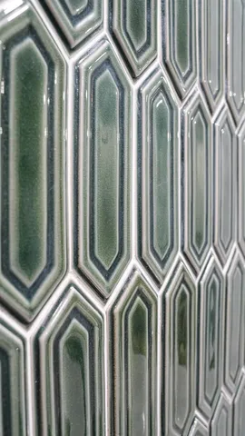 a bedroom with a bed and a night stand