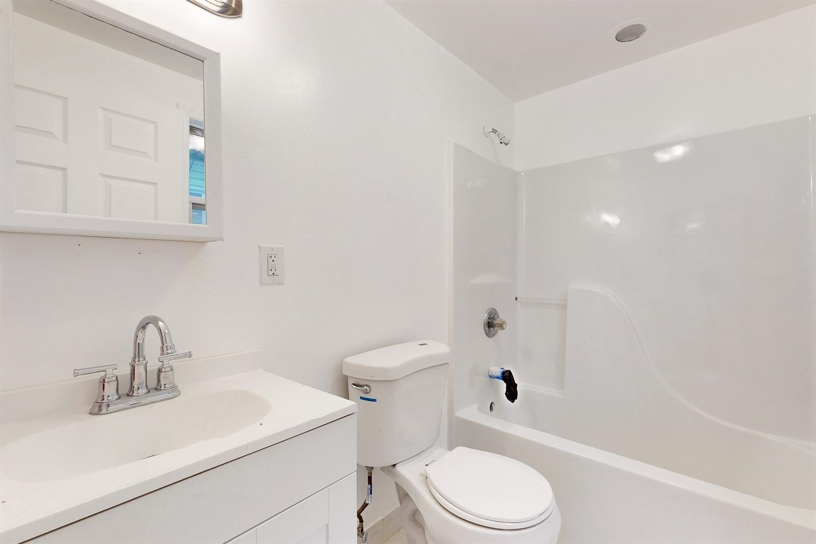 604 4th Street Hoboken, NJ 07030 - Photo 19 of 30 a bathroom with a sink toilet vanity and shower