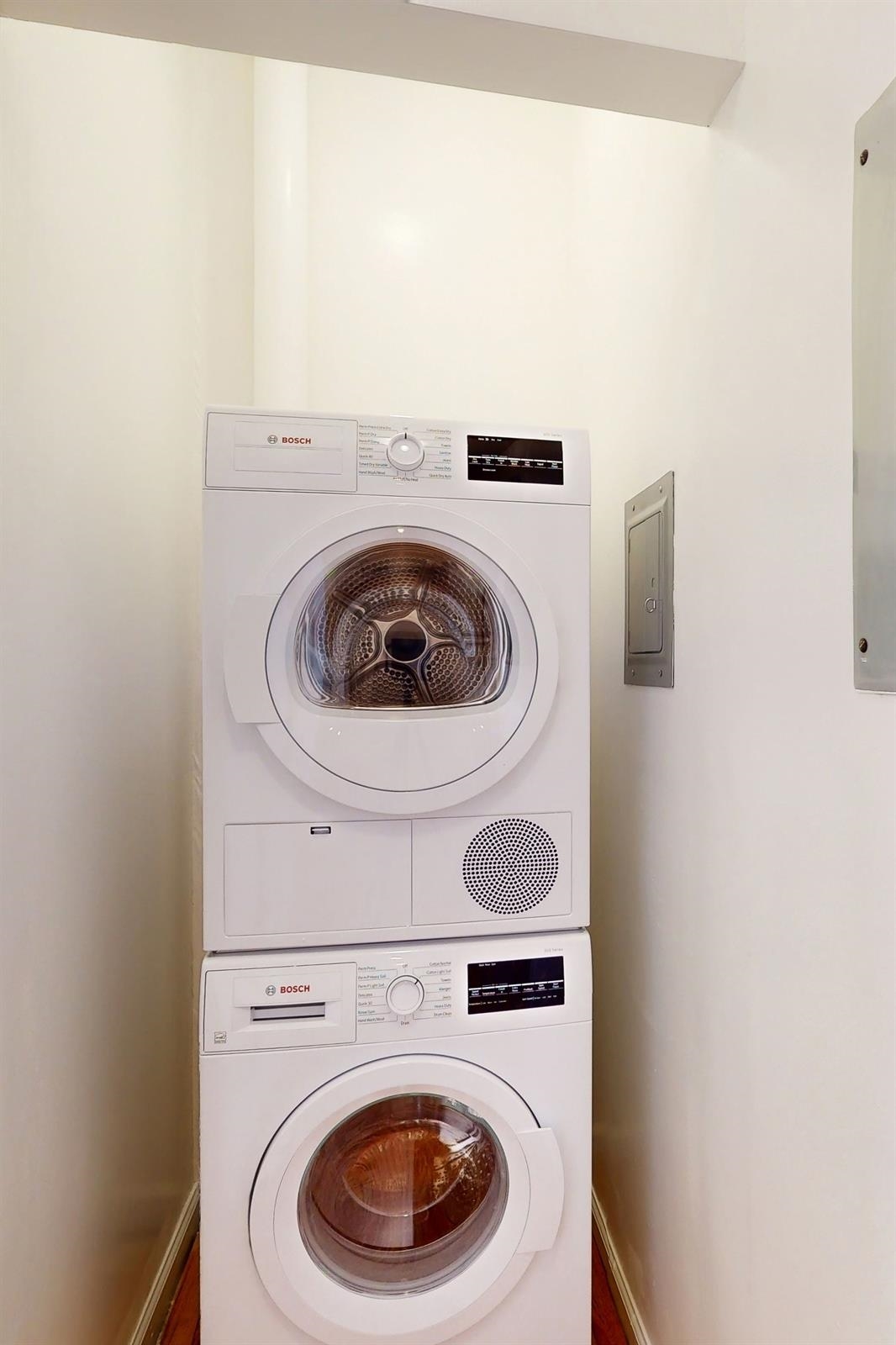 604 4th Street Hoboken, NJ 07030 - Photo 20 of 30 a utility room with dryer and washer