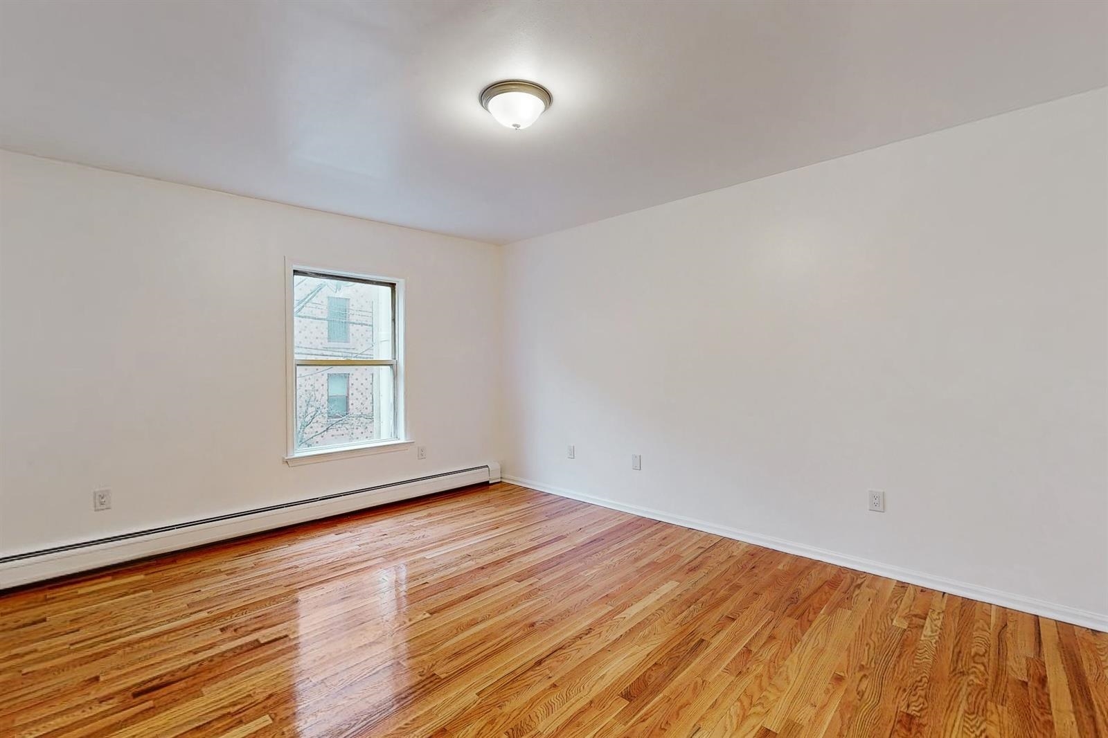 604 4th Street Hoboken, NJ 07030 - Photo 21 of 30 wooden floor in a room