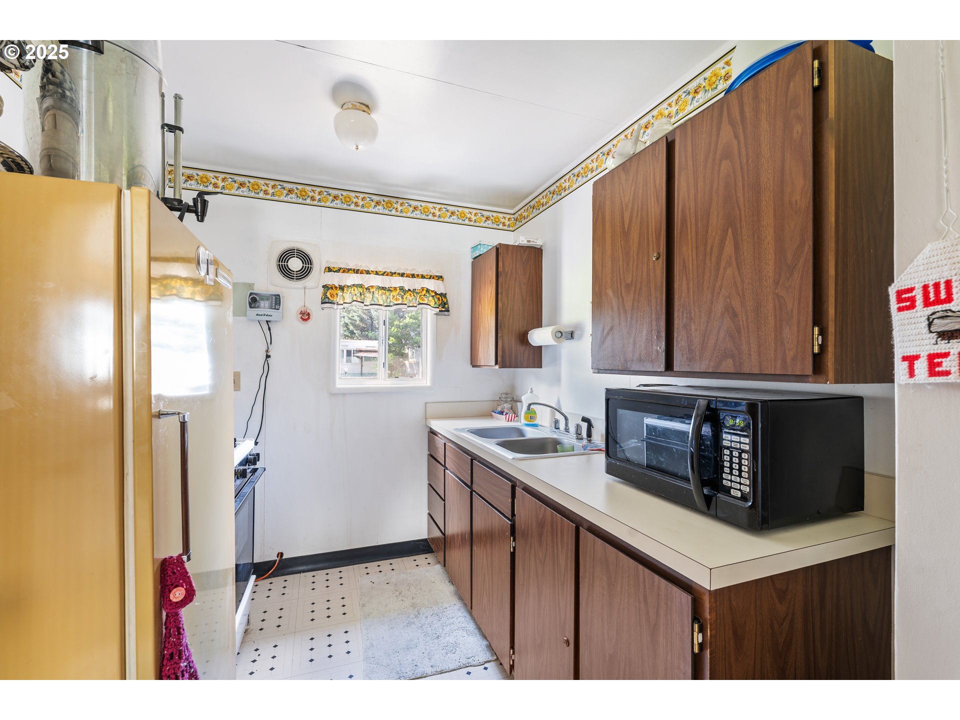 1625 Henderson Avenue Eugene, OR 97403 - Photo 13 of 20 a kitchen view with granite countertop a sink stove and refrigerator