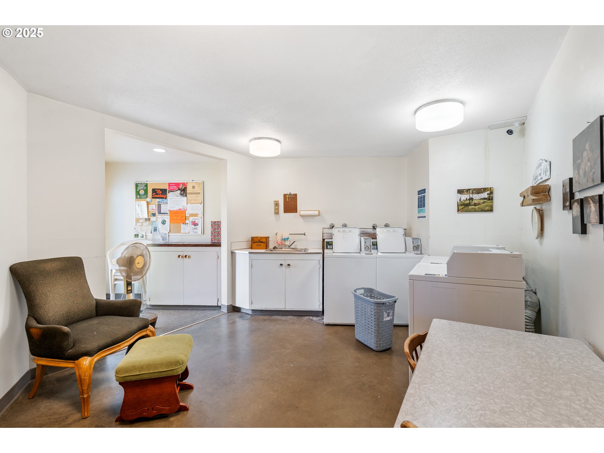 1625 Henderson Avenue Eugene, OR 97403 - Photo 16 of 20 a living room with furniture and a wooden floor