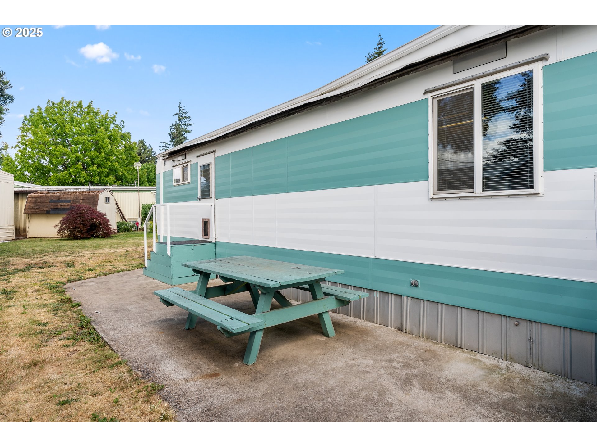 1625 Henderson Avenue Eugene, OR 97403 - Photo 17 of 20 a backyard of a house with yard and outdoor seating
