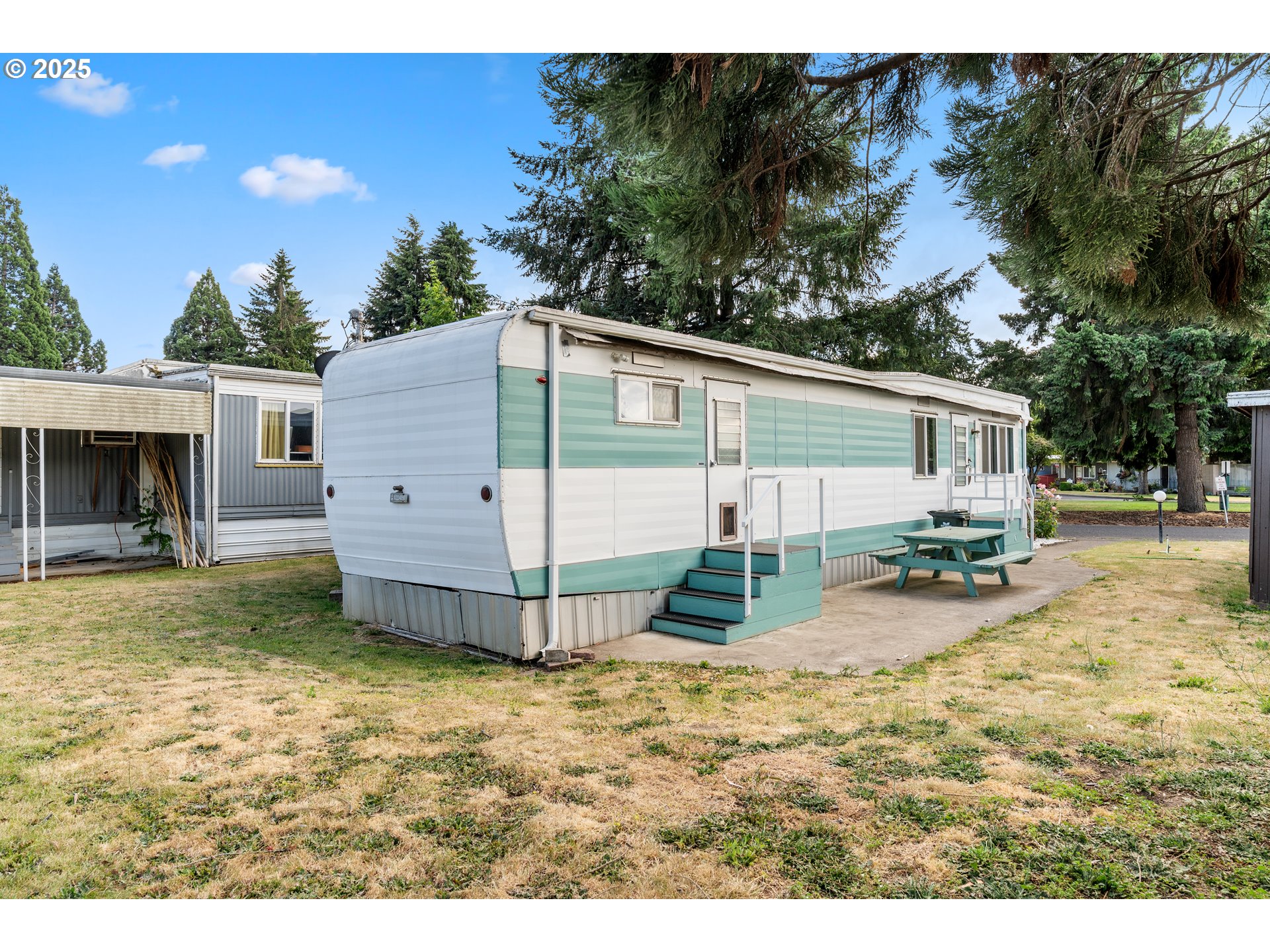 1625 Henderson Avenue Eugene, OR 97403 - Photo 18 of 20 a view of a house with backyard and trees