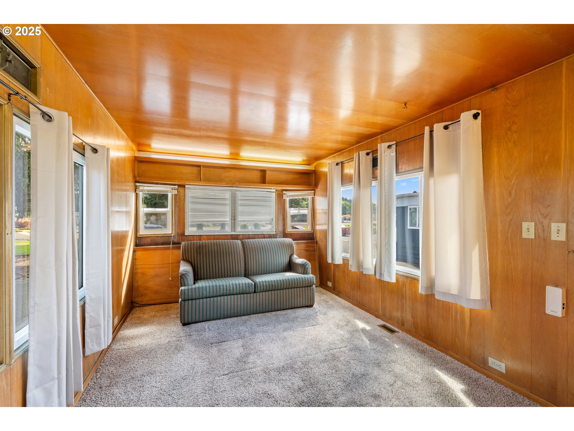 1625 Henderson Avenue Eugene, OR 97403 - Photo 3 of 20 a living room with furniture and a large window