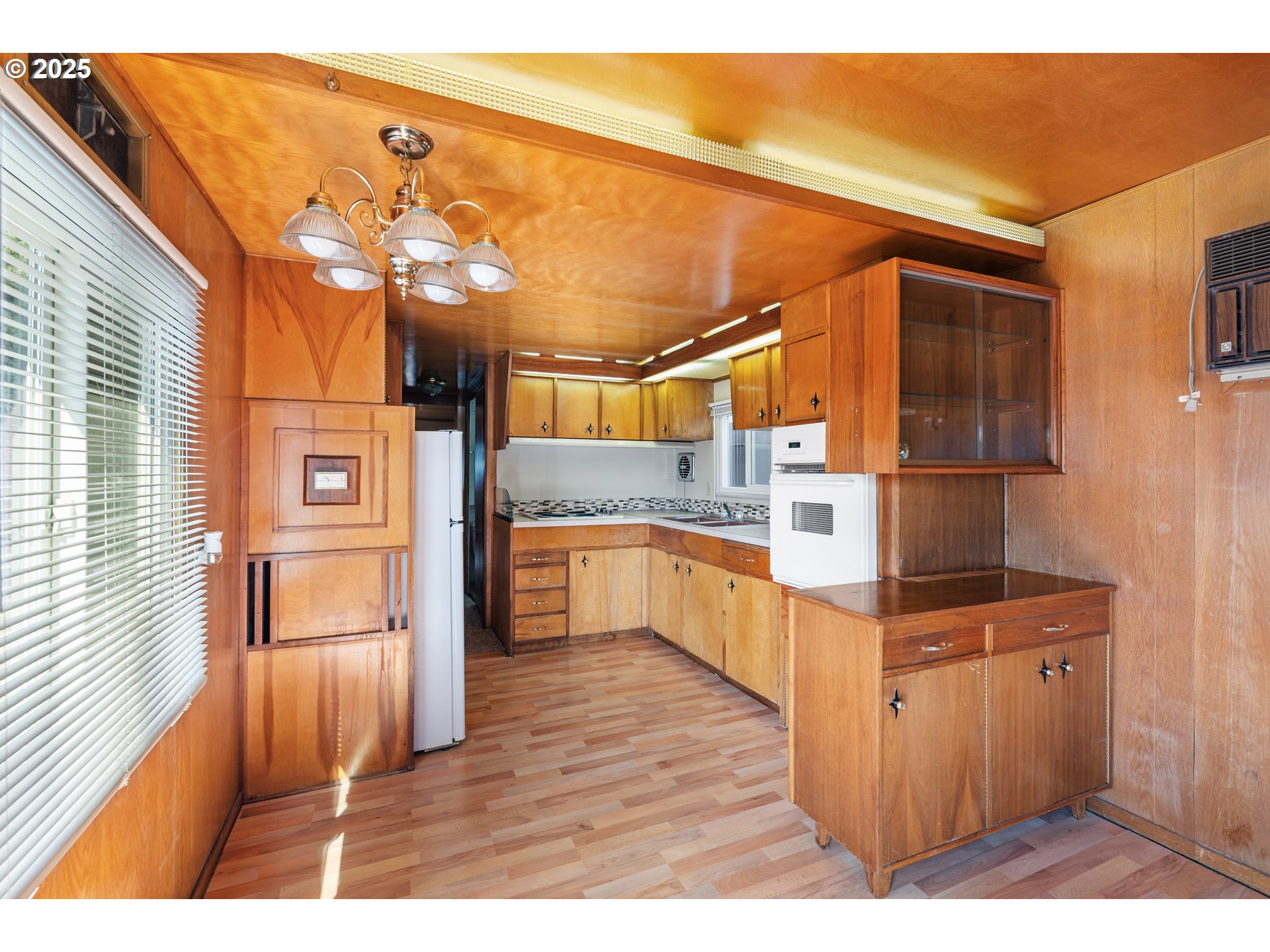 1625 Henderson Avenue Eugene, OR 97403 - Photo 5 of 20 a kitchen with stainless steel appliances granite countertop a refrigerator and a stove top oven