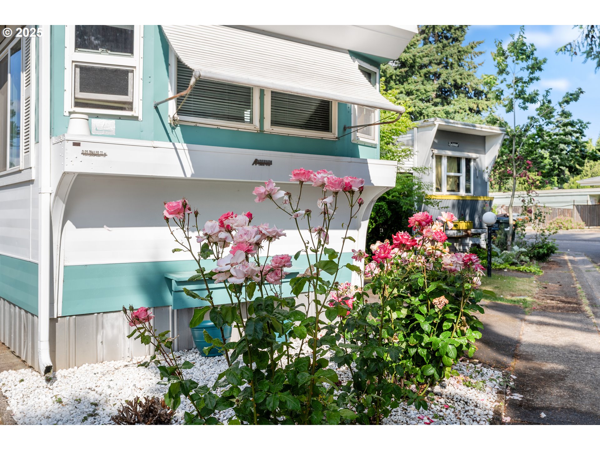 1625 Henderson Avenue Eugene, OR 97403 - Photo 7 of 20 a front view of a house with a yard and fountain