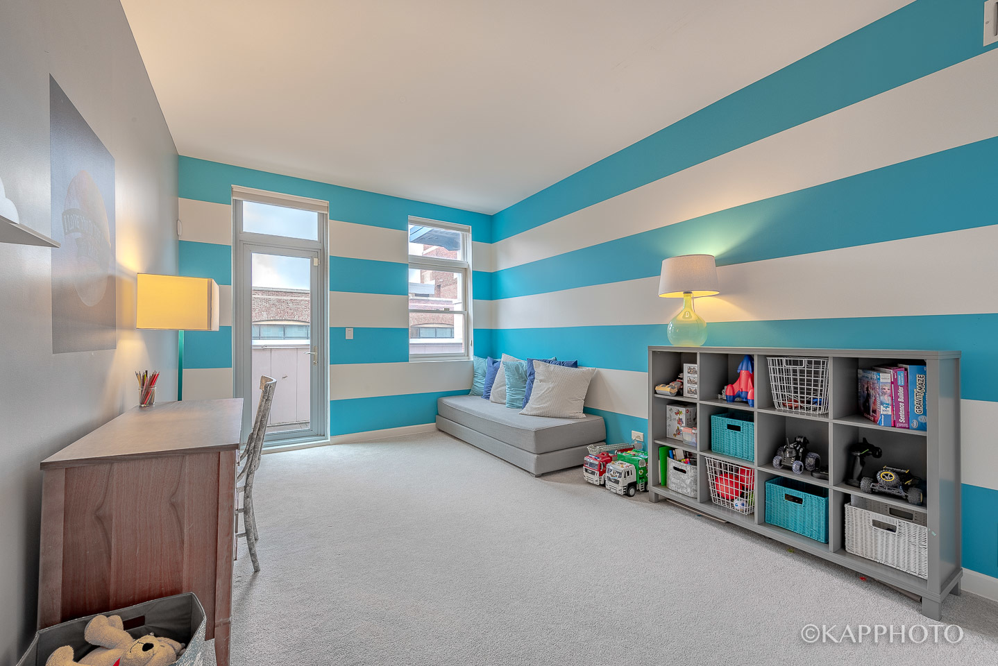 27 North Racine Avenue, Unit 432 Chicago, IL 60607 - Photo 17 of 28 a living room with furniture and a book shelf