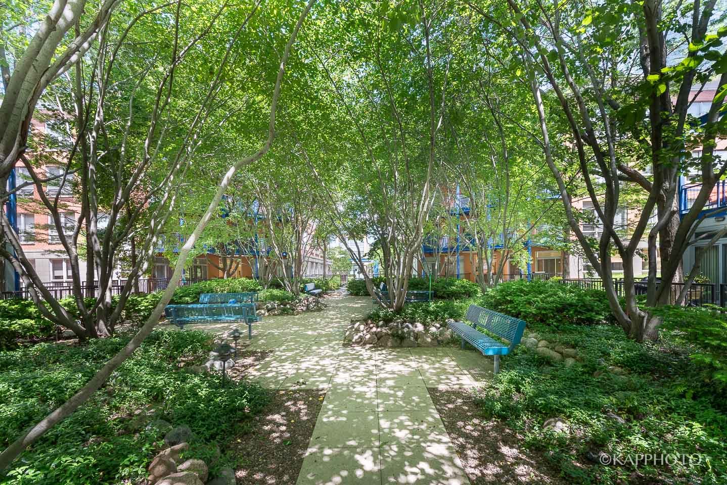 27 North Racine Avenue, Unit 432 Chicago, IL 60607 - Photo 2 of 28 a backyard of a house with lots of green space