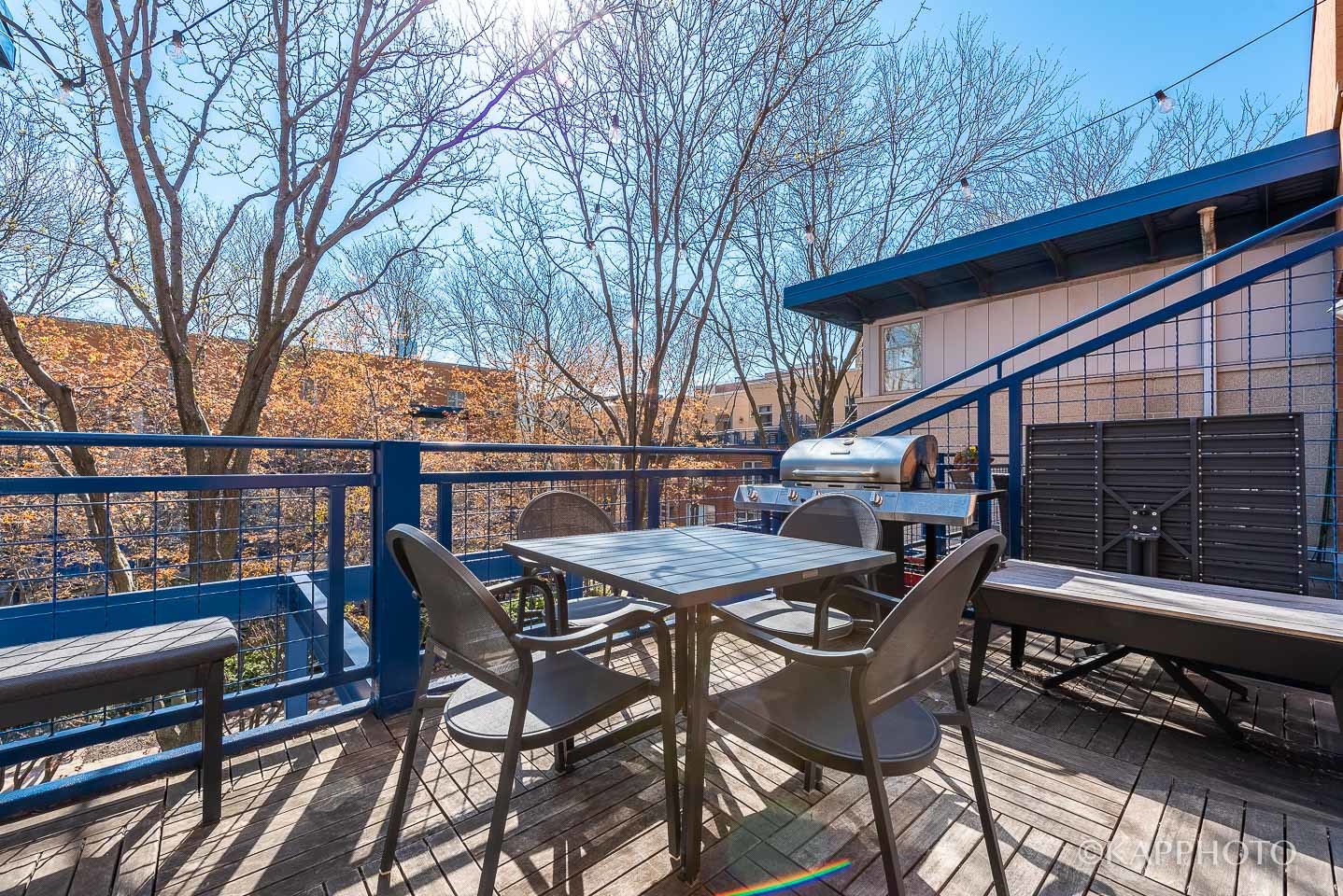 27 North Racine Avenue, Unit 432 Chicago, IL 60607 - Photo 27 of 28 a view of a chairs and table on the deck