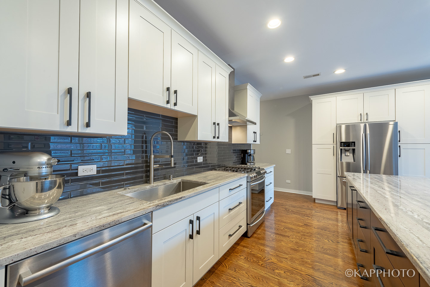 27 North Racine Avenue, Unit 432 Chicago, IL 60607 - Photo 7 of 28 a kitchen with stainless steel appliances granite countertop a sink stove and refrigerator