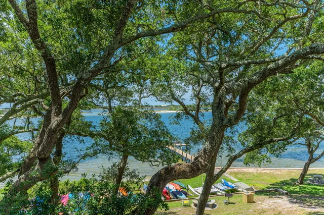 an aerial view of a house with outdoor space