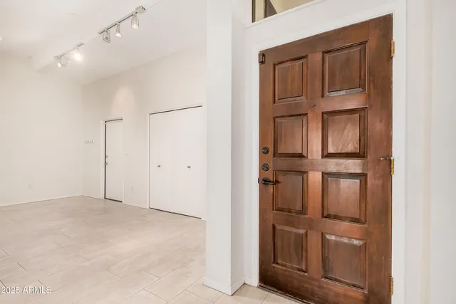 a view of an empty room with cabinet