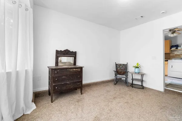 a view of a room with table and chair